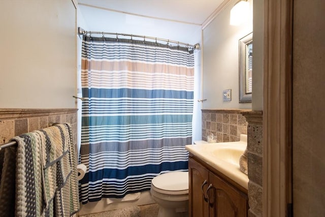 17 Lantern Rd, Revere, MA 02151 - full bathroom with tile walls, toilet, vanity, a wainscoted wall, and a shower with curtain