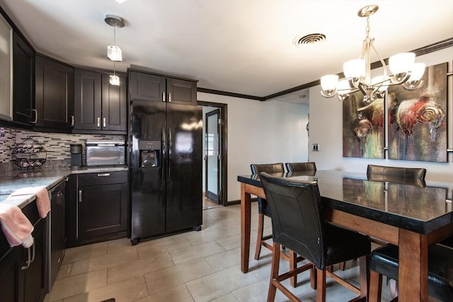17 Lantern Rd, Revere, MA 02151 - kitchen featuring black refrigerator with ice dispenser, a chandelier, backsplash, crown molding, and hanging light fixtures