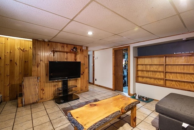 17 Lantern Rd, Revere, MA 02151 - tiled living area featuring a paneled ceiling, wooden walls, baseboards, and recessed lighting
