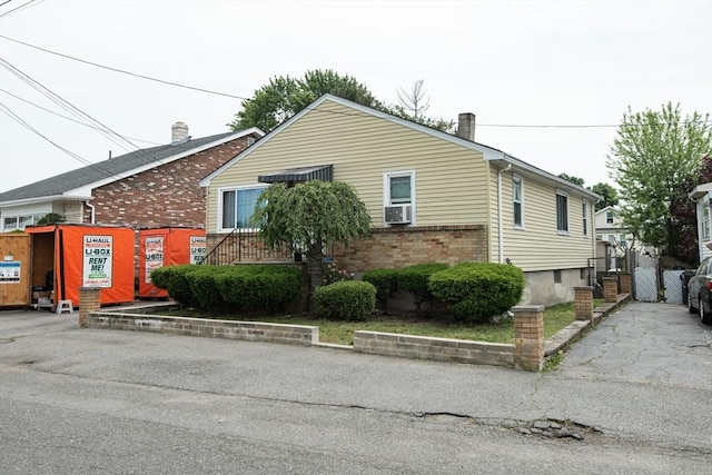 17 Lantern Rd, Revere, MA 02151 - view of front of house featuring brick siding and cooling unit