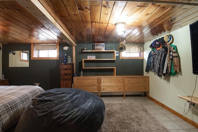 17 Lantern Rd, Revere, MA 02151 - bedroom featuring wooden ceiling, light tile patterned floors, baseboards, and multiple windows