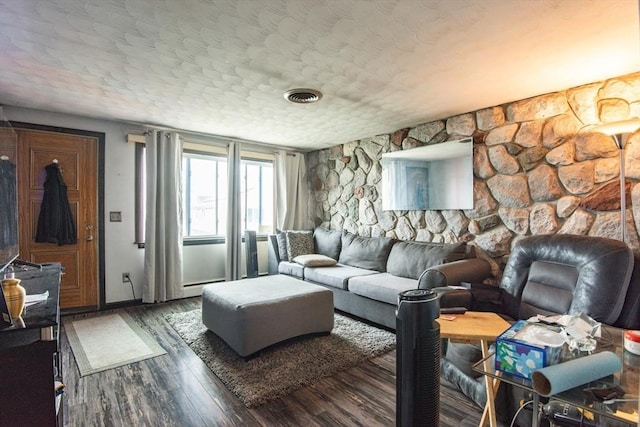 17 Lantern Rd, Revere, MA 02151 - living room with wood finished floors, baseboards, and a textured ceiling