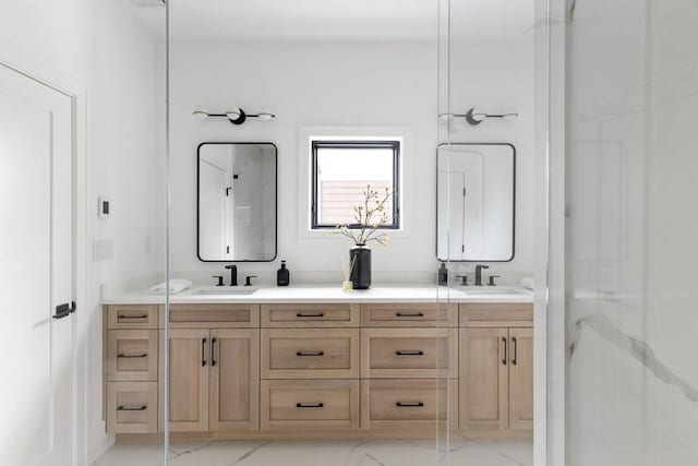 224 Auburn St Unit F, Newton, MA 02466 - bathroom with marble look tile flooring, double vanity, and a shower