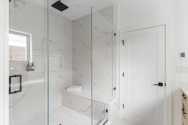 224 Auburn St Unit F, Newton, MA 02466 - bathroom with a marble finish shower and vanity