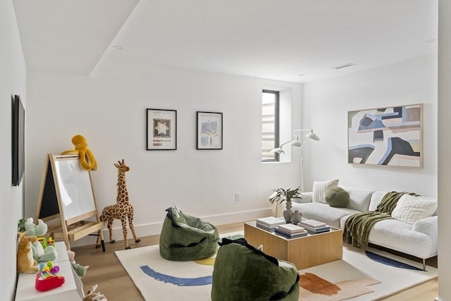 224 Auburn St Unit F, Newton, MA 02466 - living room with wood finished floors and baseboards