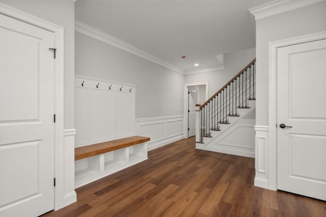 mudroom featuring a decorative wall, recessed lighting, wood finished floors, wainscoting, and crown molding