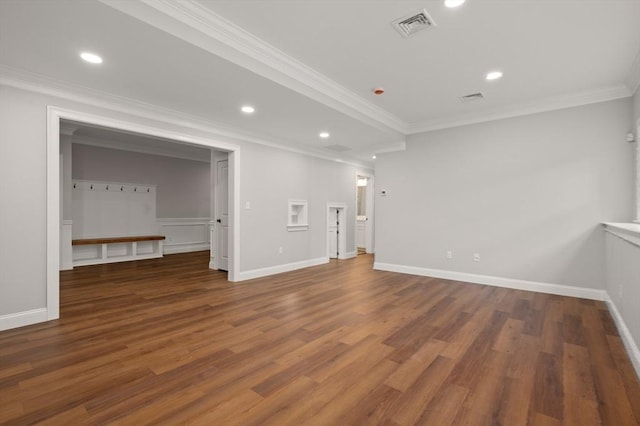 unfurnished living room featuring ornamental molding, wood finished floors, visible vents, and recessed lighting