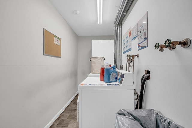 laundry room featuring washer and clothes dryer