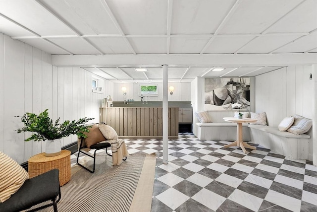 6 Manomet Rd, Woburn, MA 01801 - basement featuring tile patterned floors, bar with sink, and wood walls