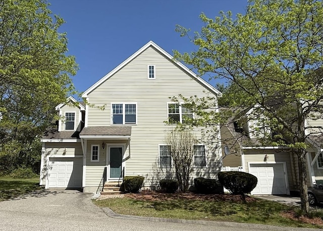 5 Samantha Way Unit 5, Acton, MA 01720 - traditional-style house with entry steps, an attached garage, and asphalt driveway