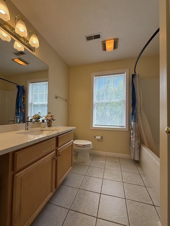 5 Samantha Way Unit 5, Acton, MA 01720 - bathroom featuring toilet, vanity, tile patterned floors, shower / tub combo, and baseboards