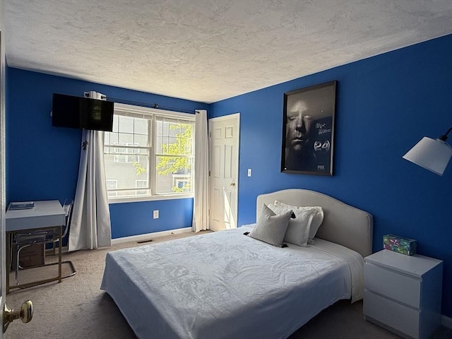 5 Samantha Way Unit 5, Acton, MA 01720 - bedroom with a textured ceiling, carpet flooring, and baseboards