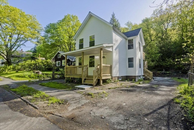 231 Hope St, Greenfield, MA 01301 - view of front facade featuring covered porch