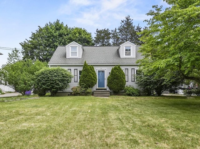 23 Ivan St, Lexington, MA 02420 - new england style home with a front yard and roof with shingles