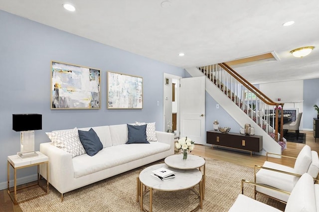 23 Ivan St, Lexington, MA 02420 - living room featuring wood finished floors, stairs, and recessed lighting
