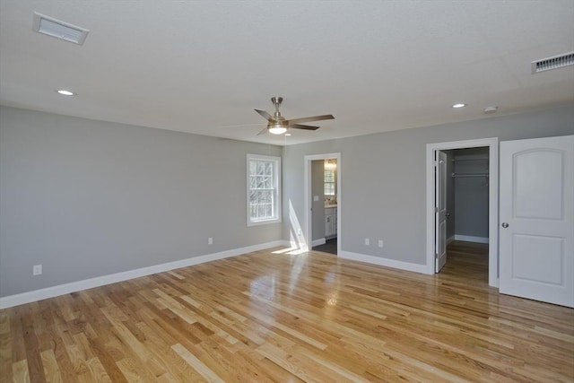 15 Fernwood, East Longmeadow, MA 01028 - unfurnished bedroom featuring light wood-style flooring, recessed lighting, a walk in closet, ensuite bath, and a ceiling fan