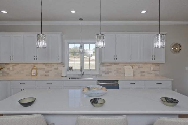 15 Fernwood, East Longmeadow, MA 01028 - kitchen featuring a breakfast bar, dishwasher, white cabinets, light countertops, and ornamental molding
