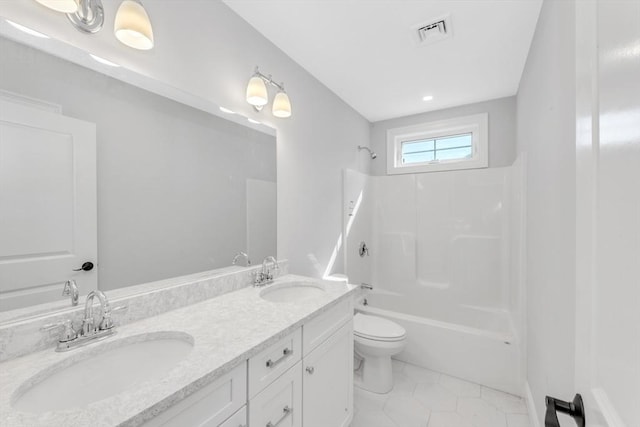 full bathroom with tile patterned floors, vanity,  shower combination, and toilet