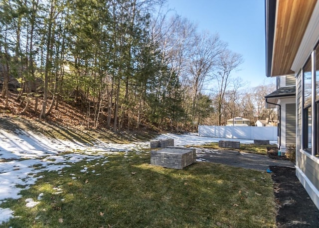 view of yard featuring fence and a patio