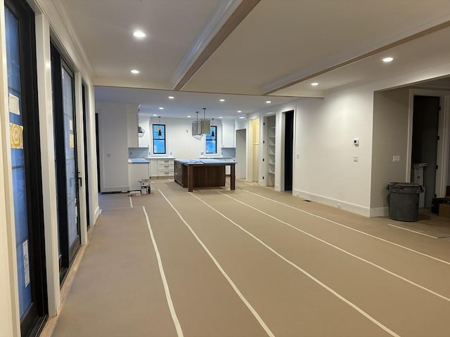 interior space with recessed lighting and baseboards