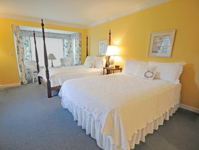 carpeted bedroom featuring crown molding