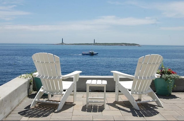 view of patio / terrace featuring a water view