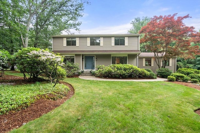 18 Juniper Ln, Framingham, MA 01701 - traditional home featuring a front lawn