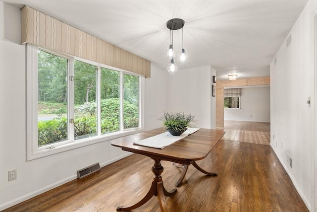 18 Juniper Ln, Framingham, MA 01701 - dining area with plenty of natural light and wood finished floors