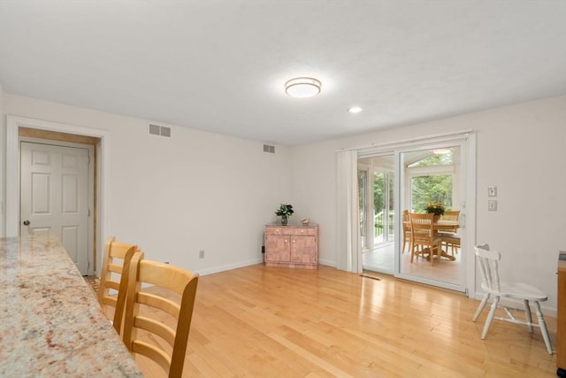 18 Juniper Ln, Framingham, MA 01701 - dining room with light wood-style flooring and recessed lighting