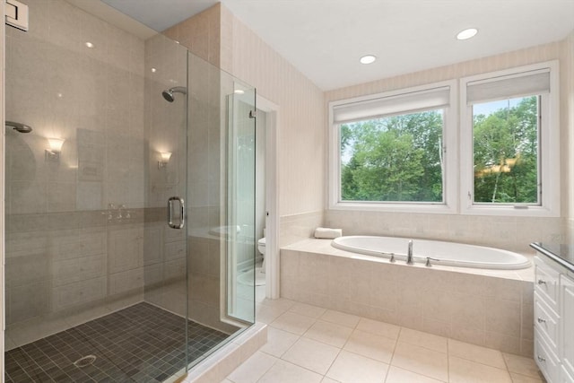 18 Juniper Ln, Framingham, MA 01701 - full bath featuring tile patterned flooring, a stall shower, and a garden tub
