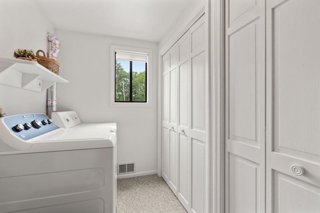 18 Juniper Ln, Framingham, MA 01701 - laundry room with washing machine and dryer and baseboards