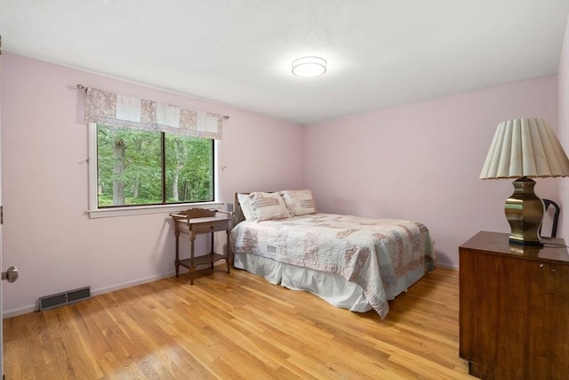 18 Juniper Ln, Framingham, MA 01701 - bedroom with light wood-style flooring