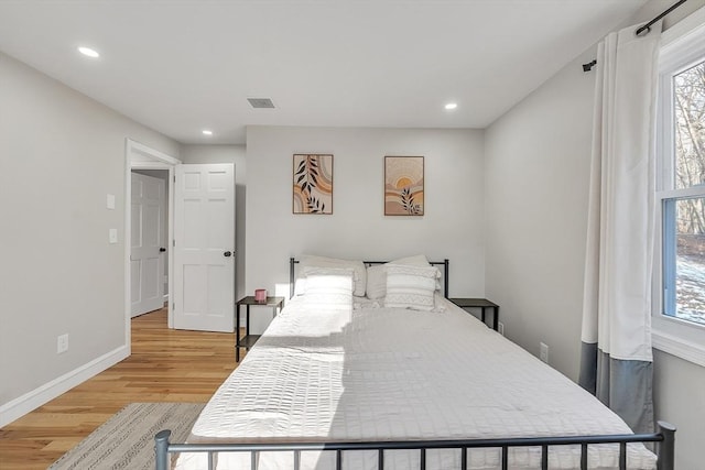 bedroom featuring light wood-type flooring