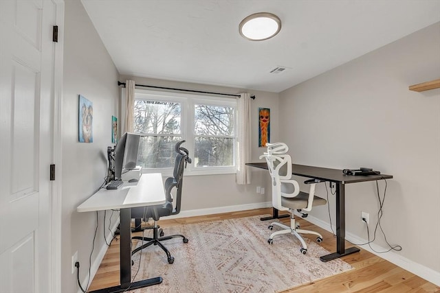 office space featuring light hardwood / wood-style floors