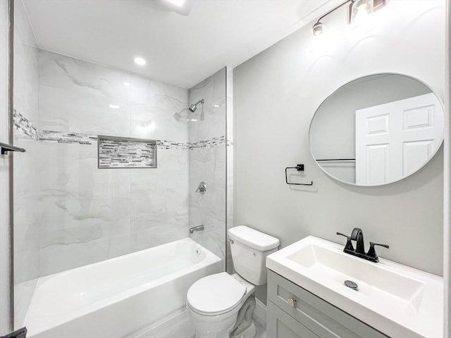 full bath with vanity, toilet, and shower / washtub combination