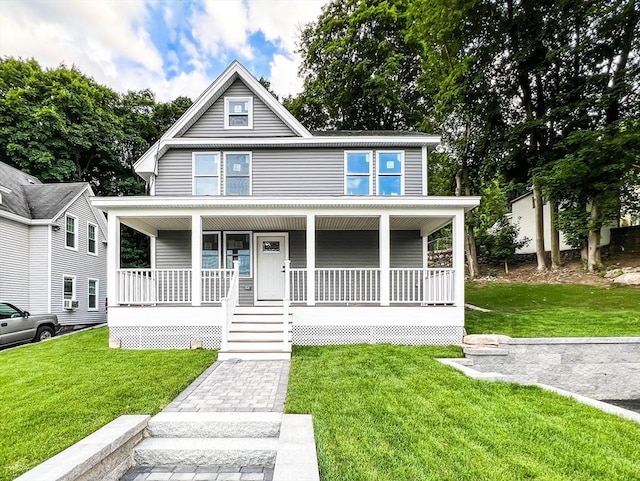 view of front facade featuring a porch and a front lawn