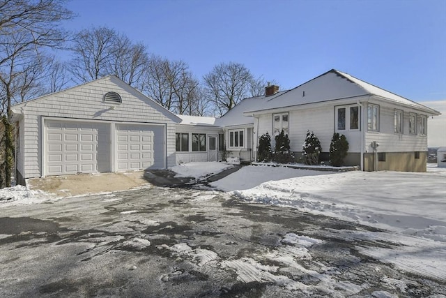 view of front of home with a garage