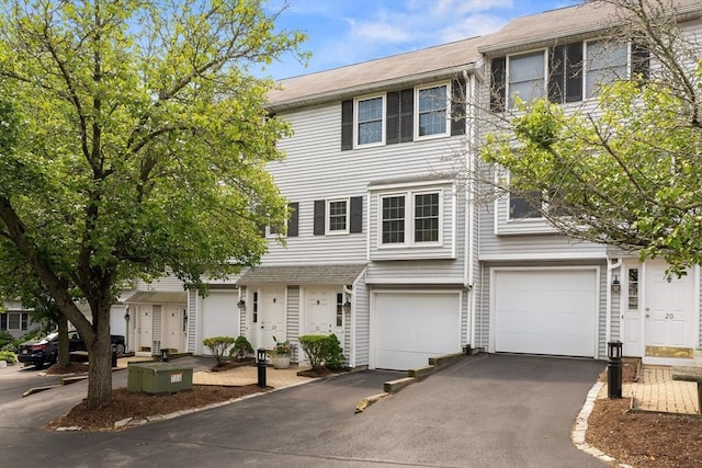 21 Fallon Ct Unit 21, Quincy, MA 02169 - view of property featuring driveway and a garage