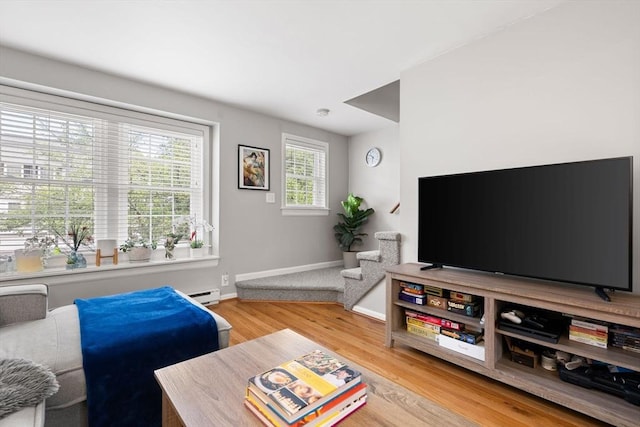 21 Fallon Ct Unit 21, Quincy, MA 02169 - living area featuring light wood-style flooring and a baseboard radiator
