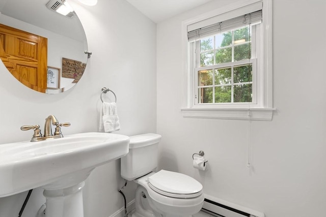 21 Fallon Ct Unit 21, Quincy, MA 02169 - bathroom with a baseboard heating unit and toilet