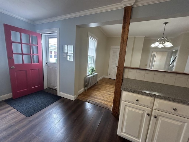 36 Edwards St, Quincy, MA 02169 - entryway featuring radiator, a chandelier, baseboards, dark wood-type flooring, and ornamental molding