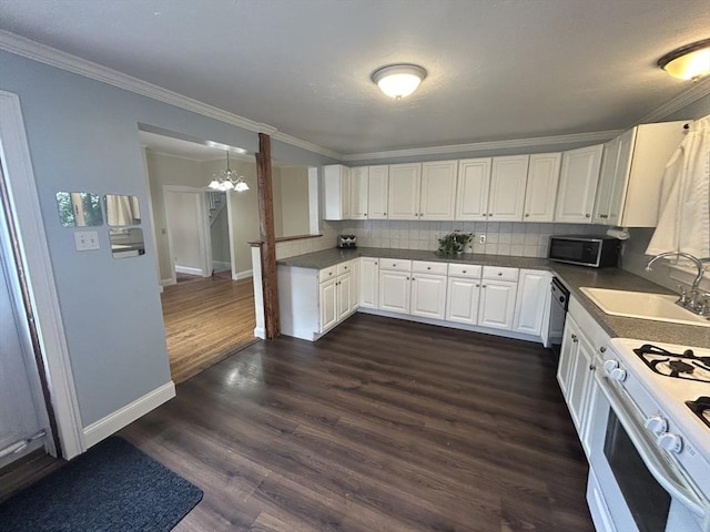 36 Edwards St, Quincy, MA 02169 - kitchen featuring a sink, baseboards, a chandelier, white cabinets, and dark wood-style floors