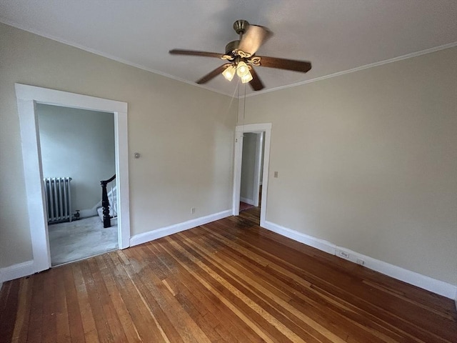 36 Edwards St, Quincy, MA 02169 - unfurnished room featuring radiator heating unit, wood-type flooring, ornamental molding, a ceiling fan, and baseboards