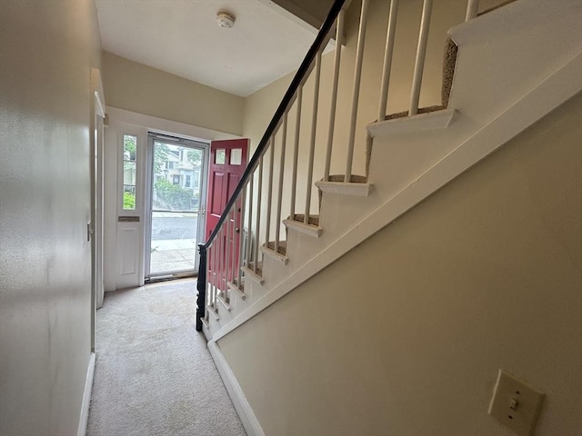 36 Edwards St, Quincy, MA 02169 - foyer with carpet floors and stairs