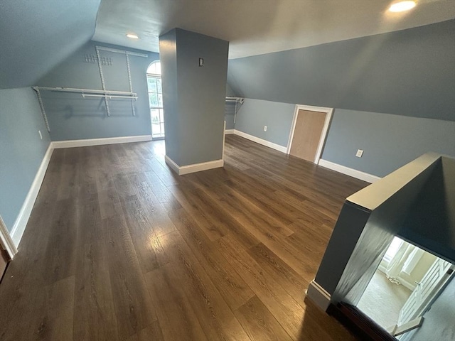 36 Edwards St, Quincy, MA 02169 - additional living space with lofted ceiling, dark wood-style flooring, and baseboards