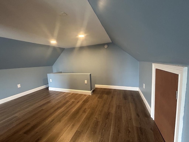 36 Edwards St, Quincy, MA 02169 - bonus room with dark wood-type flooring, vaulted ceiling, and baseboards