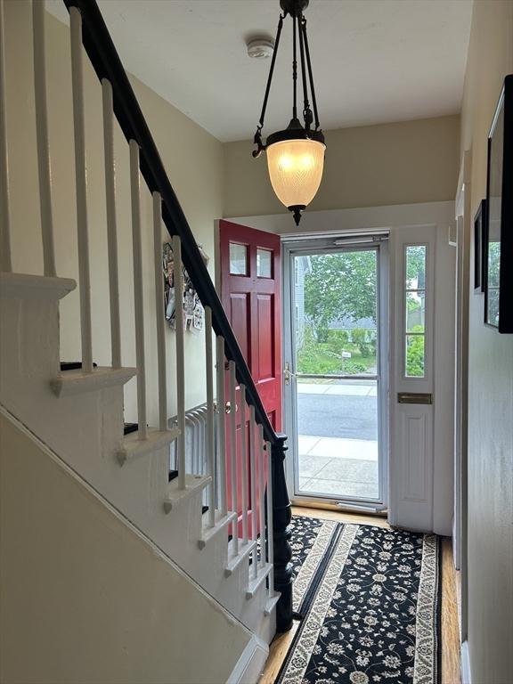 36 Edwards St, Quincy, MA 02169 - entryway featuring stairway and light wood-type flooring