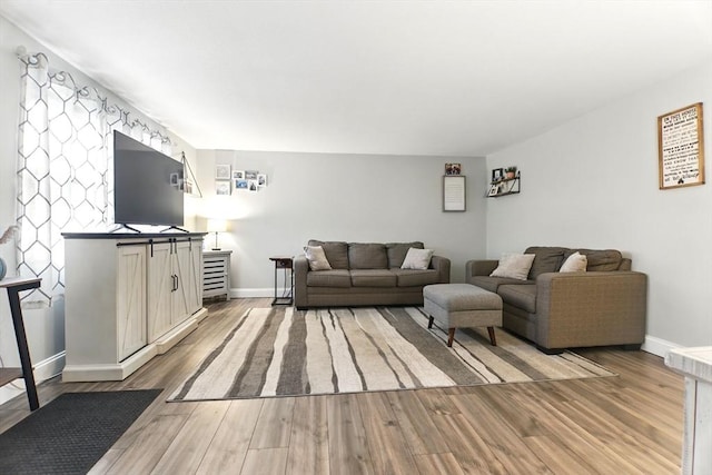 78 Yorktown Ct Unit 78, Chicopee, MA 01020 - living area with baseboards and light wood-style floors