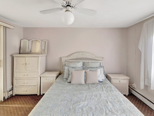 bedroom featuring baseboard heating, dark colored carpet, and ceiling fan