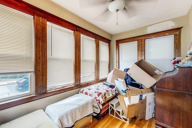 bedroom featuring ceiling fan and light wood-style flooring